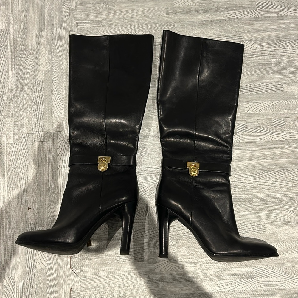 Michael Kors high heel boots . Genuine Leather and Rubber sole.
